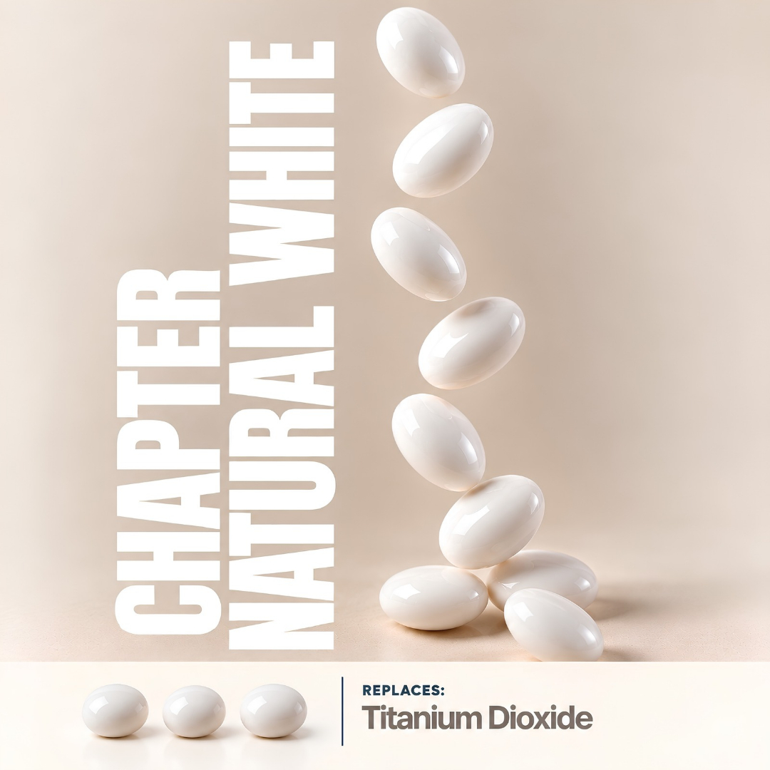 White panned candy dragées colored with Chapter Natural White, a titanium dioxide replacement