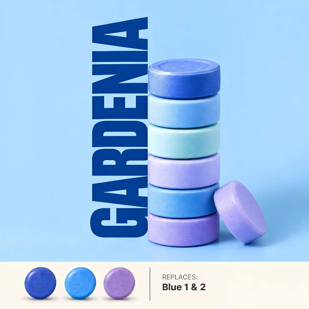 Stacked pressed tablets colored with gardenia blue, shown in royal blue, cyan and violet